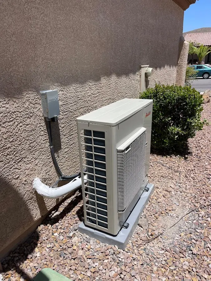 Residential air conditioning condenser unit in Mena
